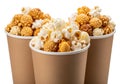 Three cups of caramel and plain popcorn isolated on white background Royalty Free Stock Photo