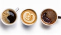 Three cups of coffee with different flavors and designs. The first cup is black, the second is brown, and the third is white Royalty Free Stock Photo