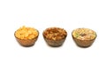 Three cups with different corn flakes