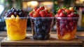 Three Cups Filled With Different Types of Fruit Royalty Free Stock Photo