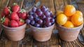 Three Cups Filled With Different Types of Fruit Royalty Free Stock Photo