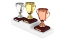 Three cups on pedestal. 3D rendering. Royalty Free Stock Photo