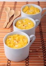 Three cups of polenta baked with cheese Royalty Free Stock Photo