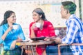 Three customers at coffee shop Royalty Free Stock Photo