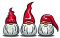 Three cute gnomes with white beards and long red hats