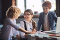 Three cute kids working on lessons together