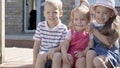 Three cute little Children enjoys delicious ice cream cone. Child eating watermelon popsicle. Kids Siblings snack sweets Royalty Free Stock Photo