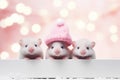 Three cute mice peek over a white banner, one of them wears a pink knit cap. Promotional banner for pet shop or vet Royalty Free Stock Photo