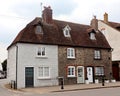 Three cute old houses on a street in Arundel.