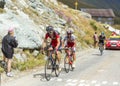 Three Cyclists in Mountains - Tour de France 2015 Royalty Free Stock Photo