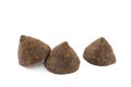 Three dark chocolate truffles Royalty Free Stock Photo