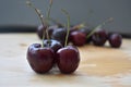 Three dark red cherries Royalty Free Stock Photo