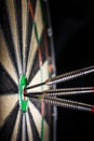 Three darts in bull`s eye