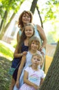 Three daughters with mother