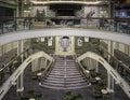 Three decks of an empty cruise ship atrium.