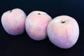 Three Decorative Plastic Peaches