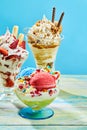 Three delicious ice cream sundaes on table Royalty Free Stock Photo