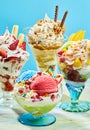 Three delicious ice cream sundaes on table Royalty Free Stock Photo