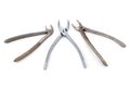 Three dental pliers