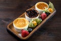 Three desserts in ramekins. Creme brulee assortment. Royalty Free Stock Photo