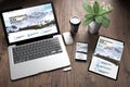 three devices on wooden desk top view mountain Royalty Free Stock Photo