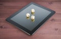 Three dice on digital tablet pc, texas game online Royalty Free Stock Photo