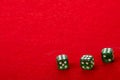 Three Dice with Value 6 on Red Velvet Playing Table - Gambling and Game Concept for Luck and Chance Games Royalty Free Stock Photo