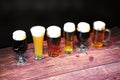 Three different beer glasses, with different types of beer, are in a row Royalty Free Stock Photo