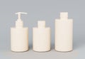 Three different beige cosmetic product bottles set template on gray background 3D render