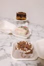 Three different bento cake on white table. Small bento cake for one person as a gift for the holiday