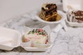 Three different bento cake on white table. Small bento cake for one person as a gift for the holiday