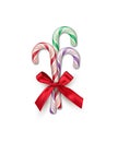 Three different color striped candy canes with red bow isolated on white background. Vector Christmas and New Year Royalty Free Stock Photo