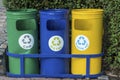 Three different container in a park for more clean planet, outddor, recycle icons
