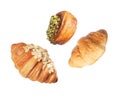 Three different croissants closeup isolated on white background Royalty Free Stock Photo