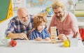 Three different generations ages: grandfather father and child son together. Happy man family have fun together Royalty Free Stock Photo
