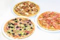 Three different kind of pizzas Royalty Free Stock Photo