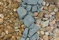 Three different pea gravel samples in rows, macro details directly above. Royalty Free Stock Photo