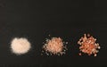 Three different pink Himalayan salts over black