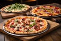 three different pizzas displayed side by side, showcasing variety Royalty Free Stock Photo