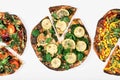 Three different vegetarian pizza on white background close up