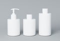 Three different white cosmetic product bottles set template on gray background 3D render Royalty Free Stock Photo