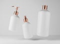 Three different white plastic bottles for hair and body care products 3D render, set of floating cosmetic containers on Royalty Free Stock Photo