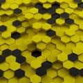 Three-dimensional array of hexagonal prisms in yellow and black, resembling a Royalty Free Stock Photo
