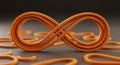 A three-dimensional orange infinity symbol, artistically crafted from interwoven rubb Royalty Free Stock Photo