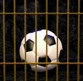 Football in gilded cage, 3d illustration