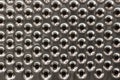 Three-dimensional texture of chrome with perforation Royalty Free Stock Photo