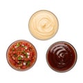 Three dips and sauces arranged in a triangle shape isolated on white background Royalty Free Stock Photo