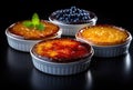 three dishes with dessert creme brulee topping