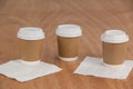 Three disposable coffee cup with tissue paper