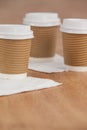 Three disposable coffee cup with tissue paper